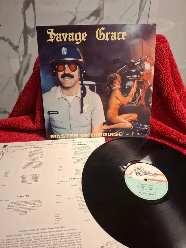Savage Grace - Master of Disguise (1985, originele Black Dragon persing met binnenhoes!)