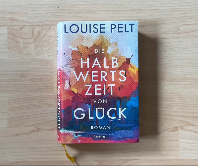 Roman "Die Halbwertszeit von Glück" von Louise Pelt Hardcover