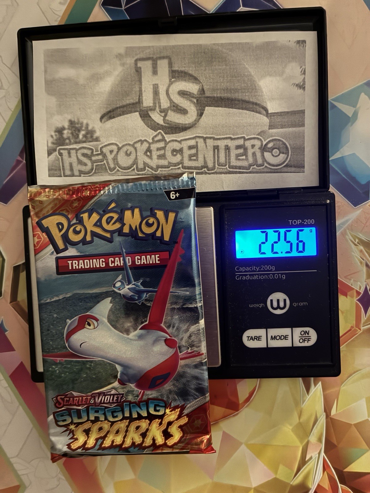 PESANTE! Confezione Booster 22,56g Scintille Surging Pokemon TCG