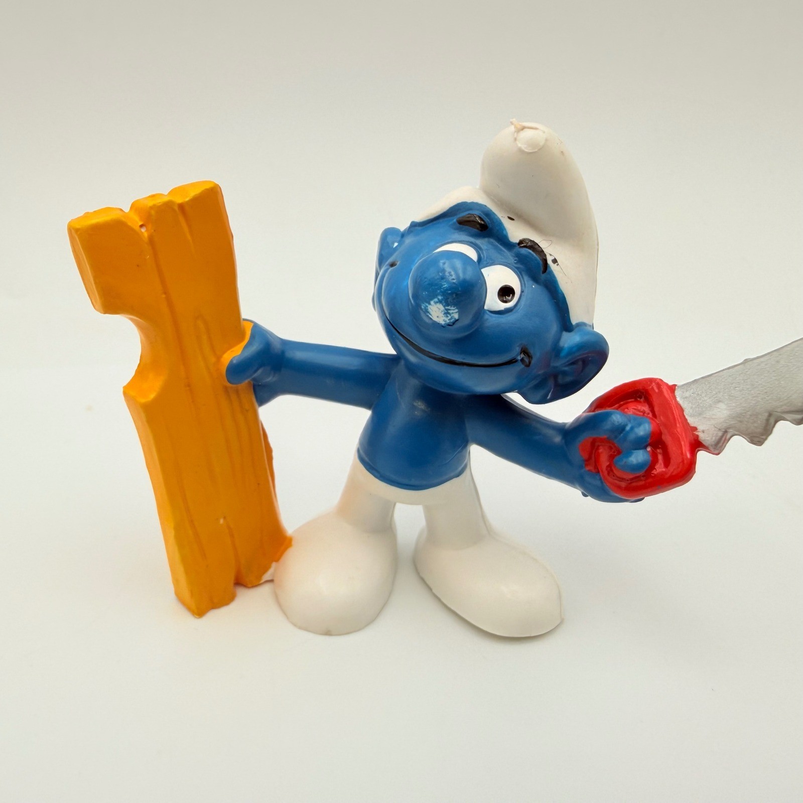 Vintage 1979 Schleich Peyo Smurf Figurine with Saw and Wood Made in Hong Kong