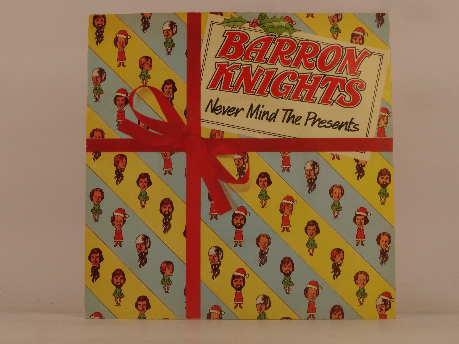 BARRON KNIGHTS NEVER MIND THE PRESENTS (135) 2 Track 7" Single plus Picture Slee