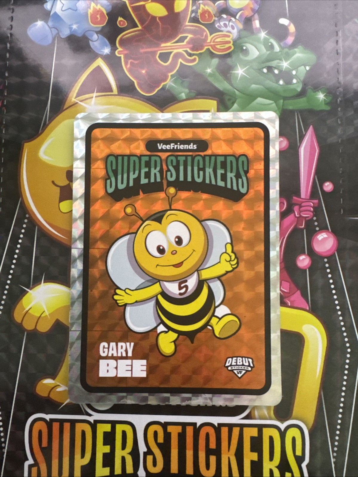 VeeFriends Serie Spettacolare Super Adesivo Gary Bee Debutto Adesivo Arancione SP