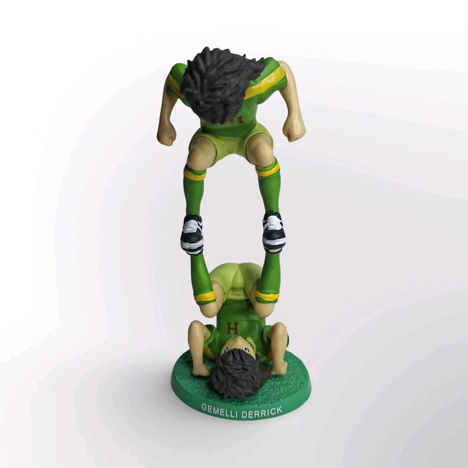 Gemelli Derrick Action figure calcio 10 cm divisa verde n.10 con base
