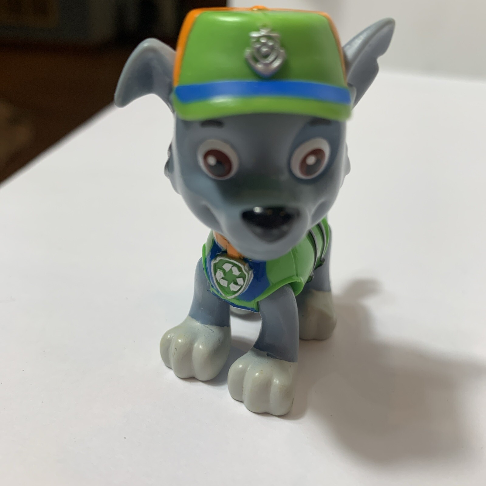 Giocattolo statuina cane Paw Patrol Rescue Pup Rocky Recycle 2,5"