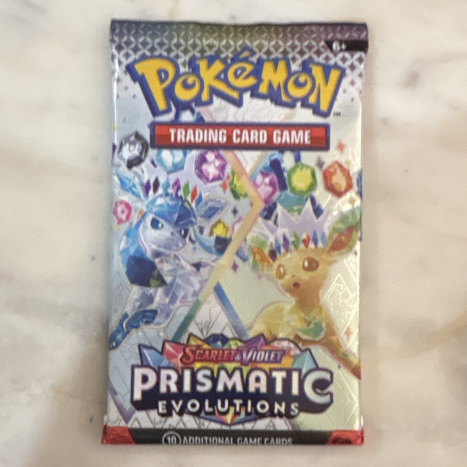 Pokémon TCG Evoluzioni Prismatiche Booster Pack Sigillato