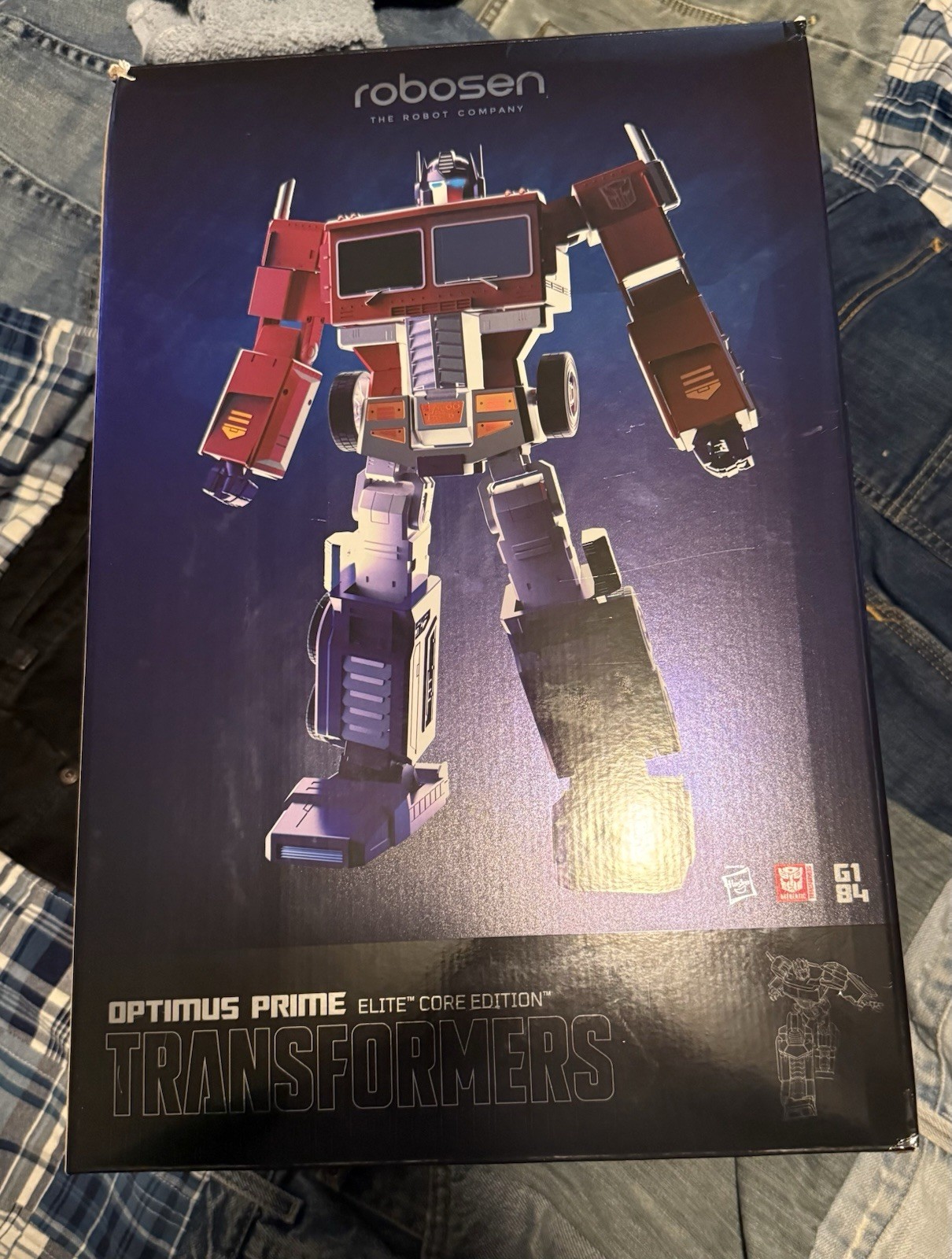 Transformers Robosen Optimus Prime G1 Robot a conversione automatica Elite