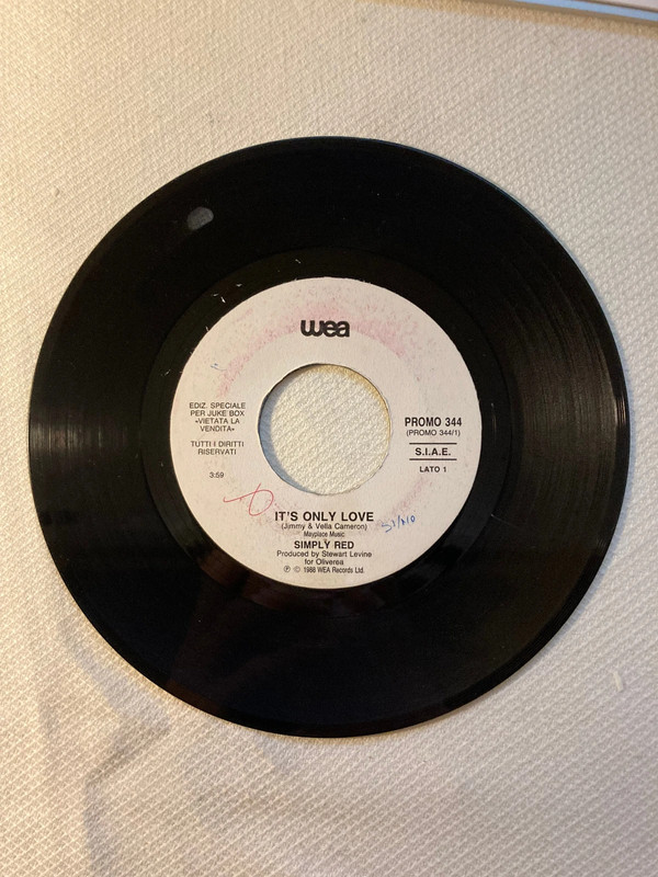 "Simply Red - It's Only Love" e "Kim Wilde - Four Letter Word", 45rpm, disco jukebox
