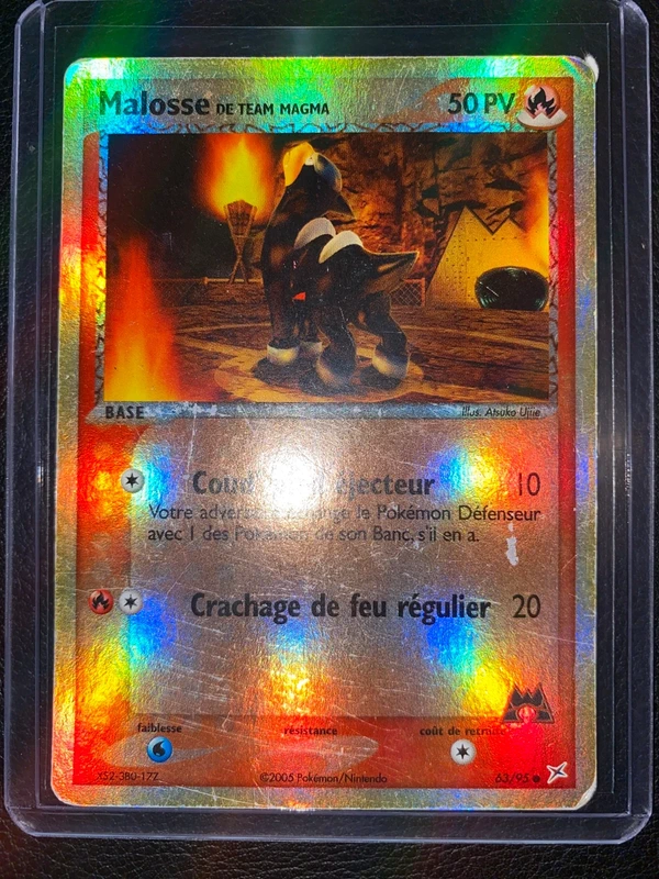 Carte Pokémon malosse riverse de team Aqua magma