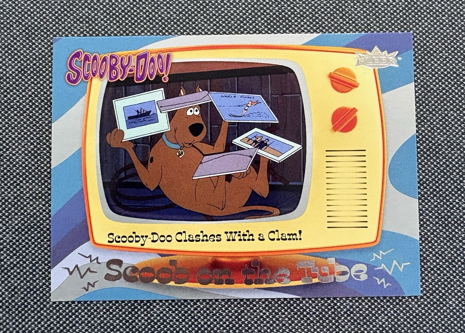 2025 UD FLEER SCOOBY-DOO #ST-16 “SCOOB ON THE TUBE” - Old Iron Face