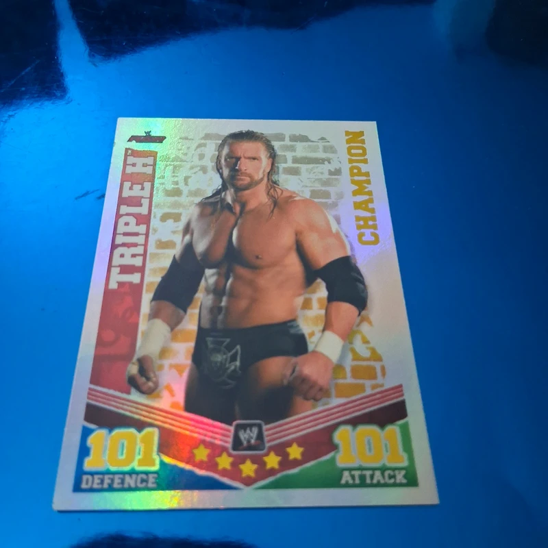 Carta slam Attax Triple H Champion
