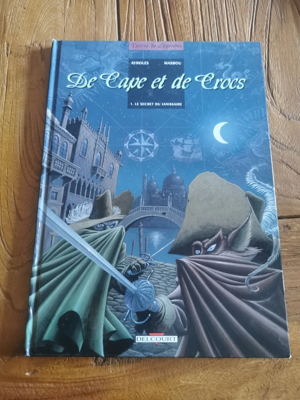 BD de cape et de crocs