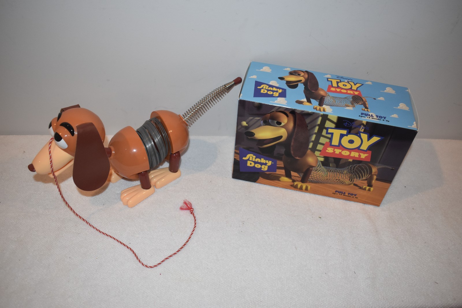 Vintage Disney Pixar TOY STORY SLINKY DOG Pull Toy con scatola originale anni 90