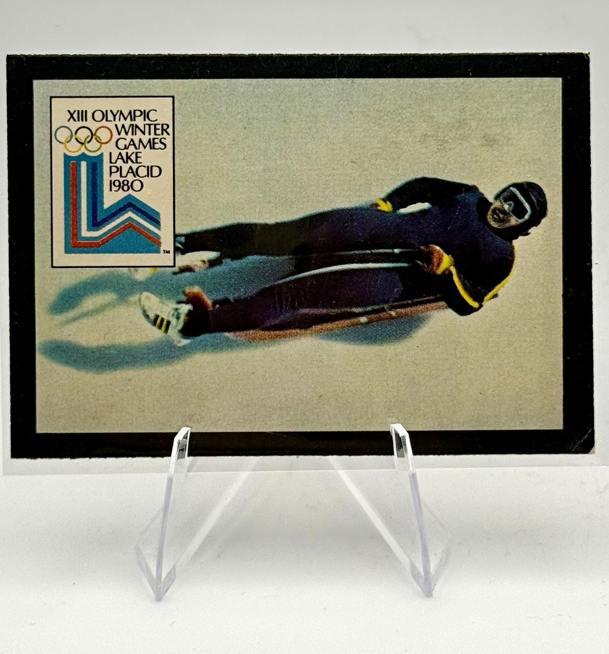 1980 KELLOGG'S OLYMPIC STICK'R TRADING CARD LUGE STICKER XIII LAKE PLACID