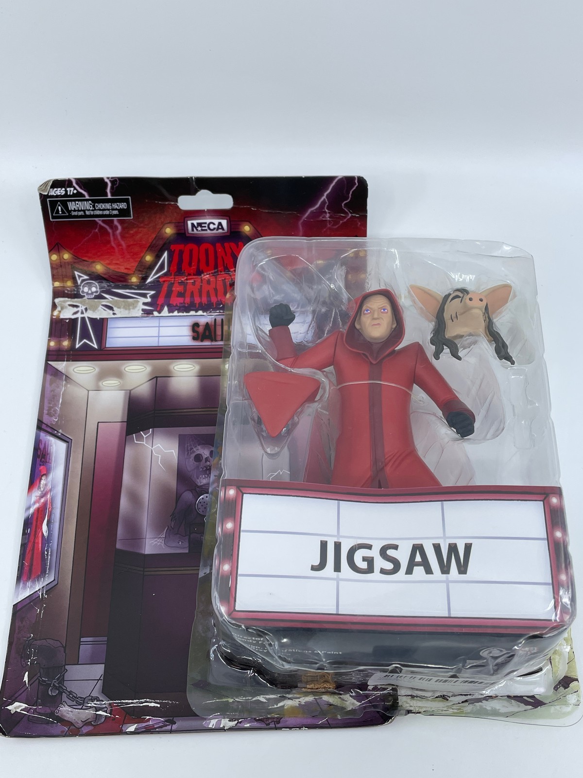 Statuina Neca Saw Toony Terrors puzzle assassino veste rossa 15 cm