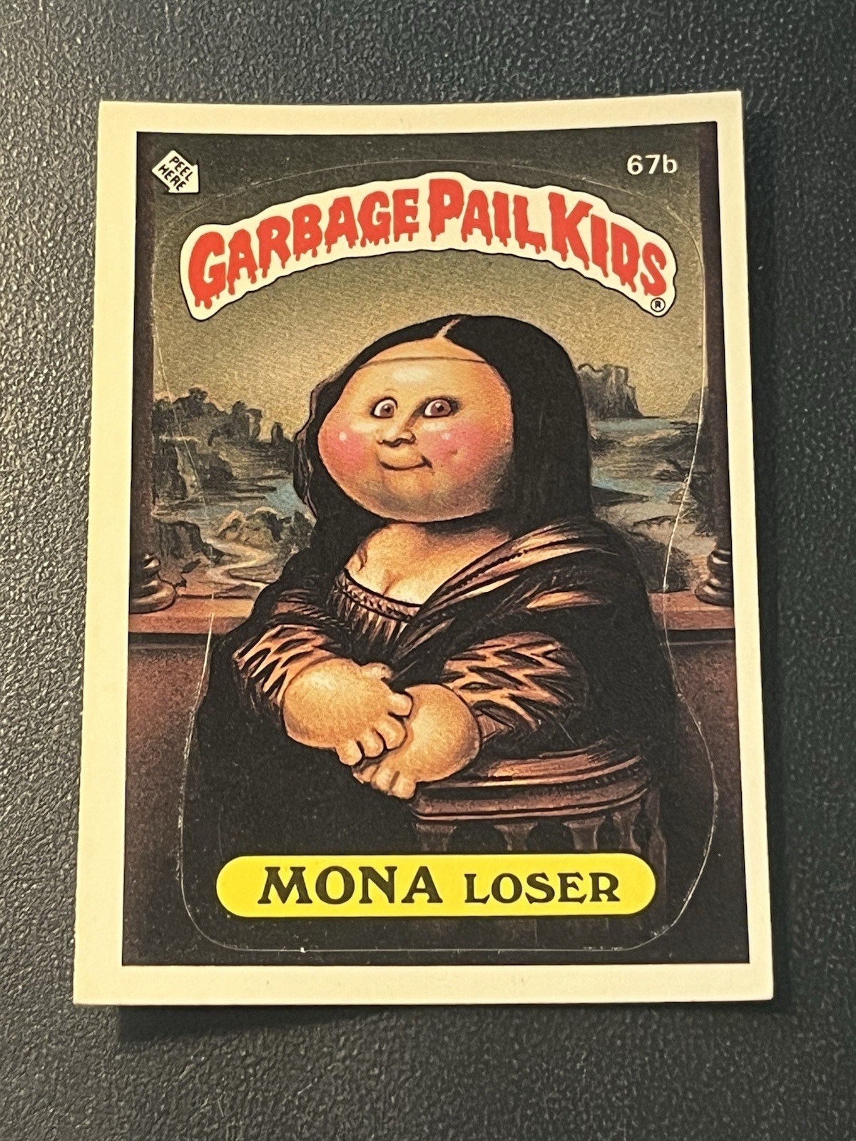 Carta Topps Garbage Pail Kids 1985 GPK serie 2 OS2 67b Mona Loser quasi nuova