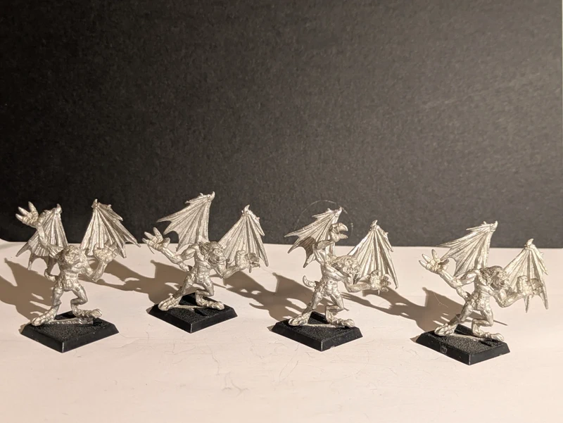 4 figurines "gargouilles" du Chaos