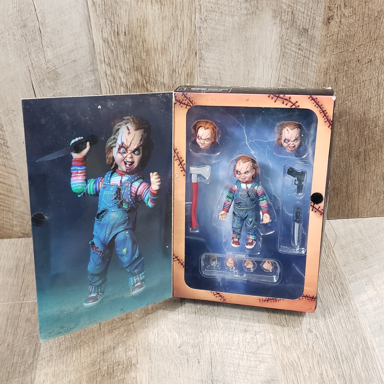 NECA Child's Play Ultimate Chucky Action Figure, Interchangeable Box Damaged
