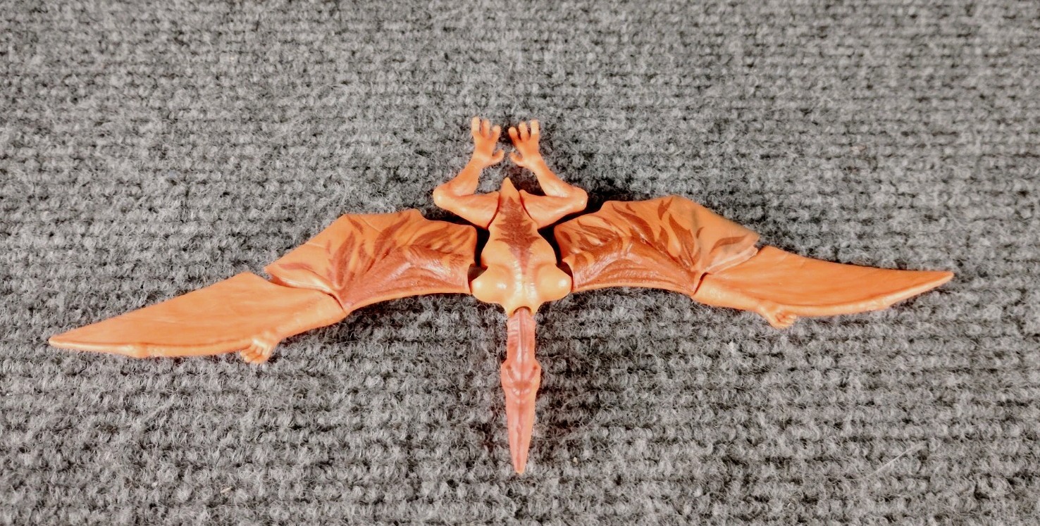 PTERODACTYL Figura arancione con apertura alare 7,5", senza marchio
