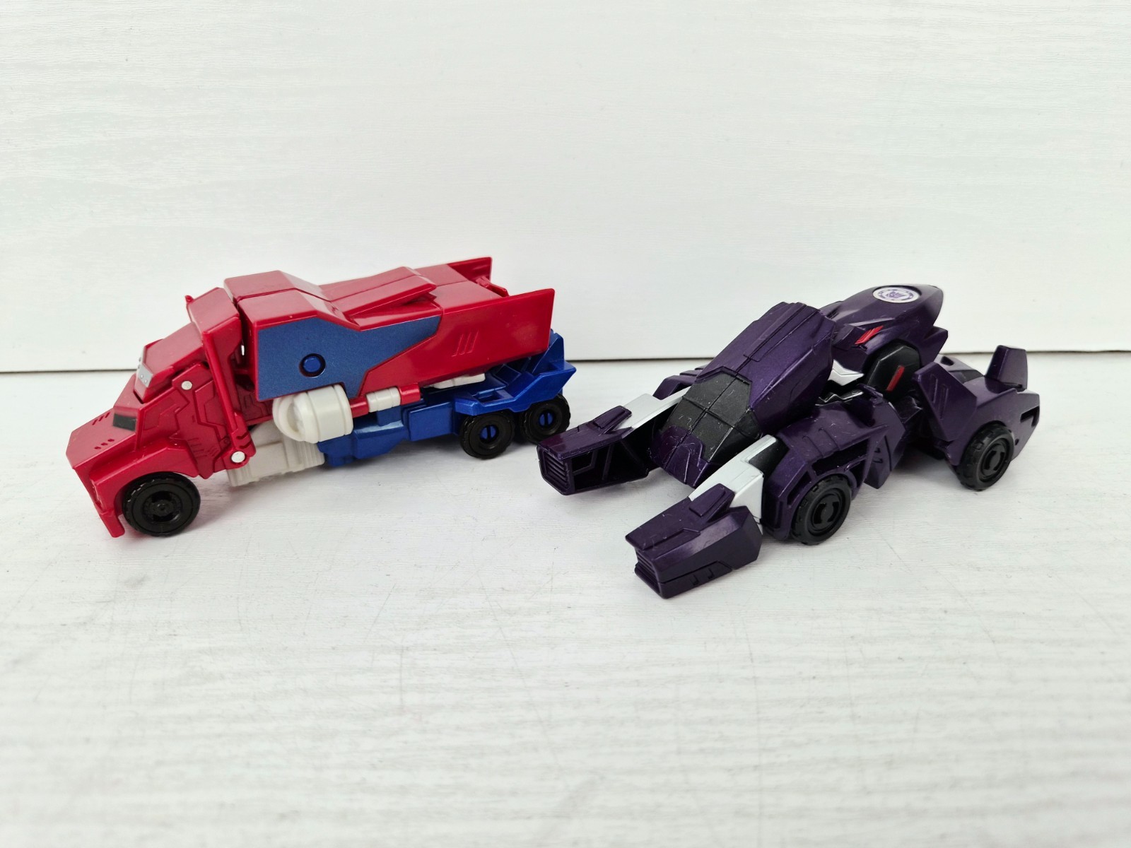 Transformers One-Step Changers - Optimus Prime & Underbite - Pacchetto di 2