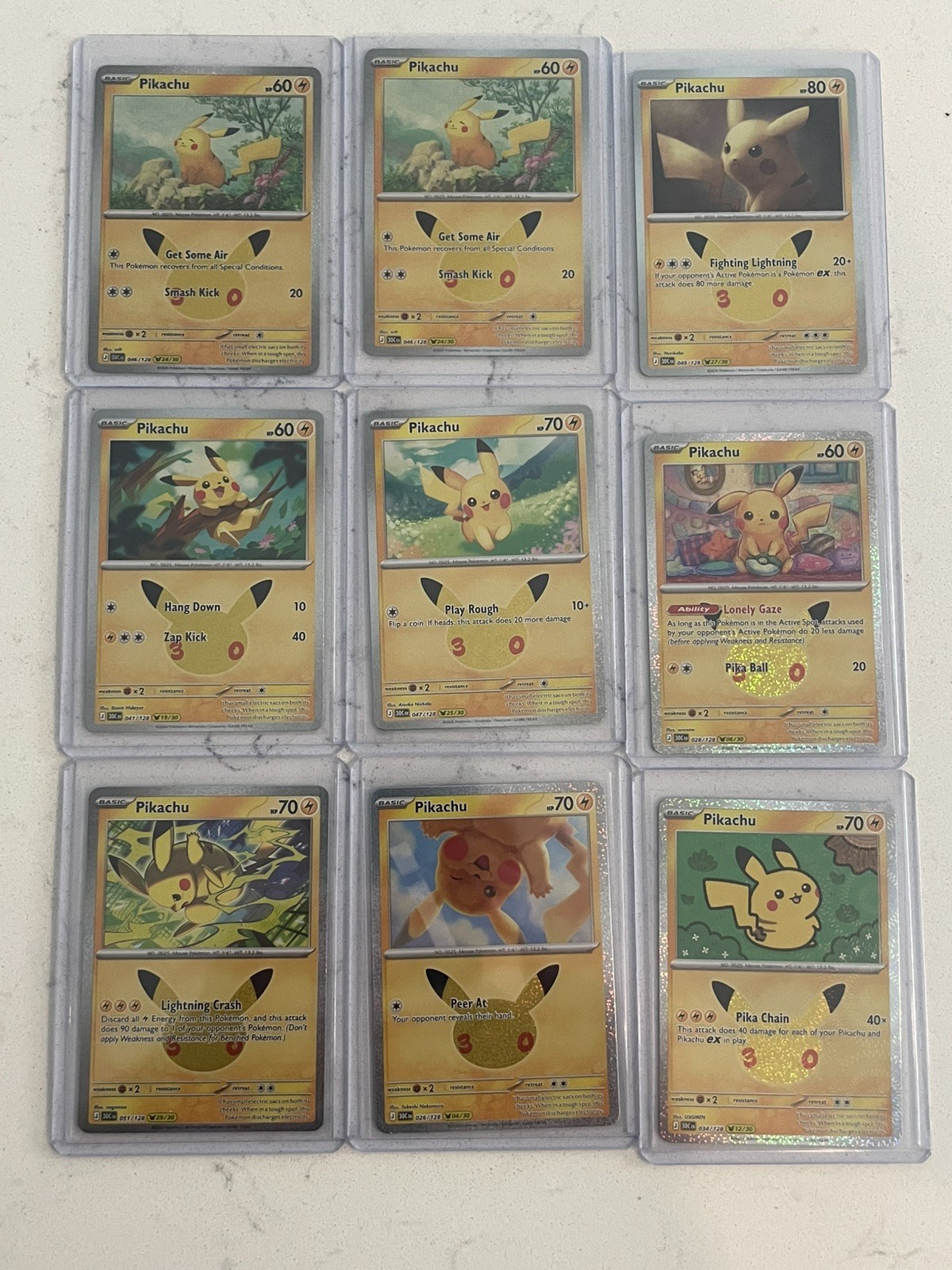 Lot 9 Pokémon TCG Pikachu 30th Anniversary Holo Rares 29-19-25-24-27-6-4-12-24