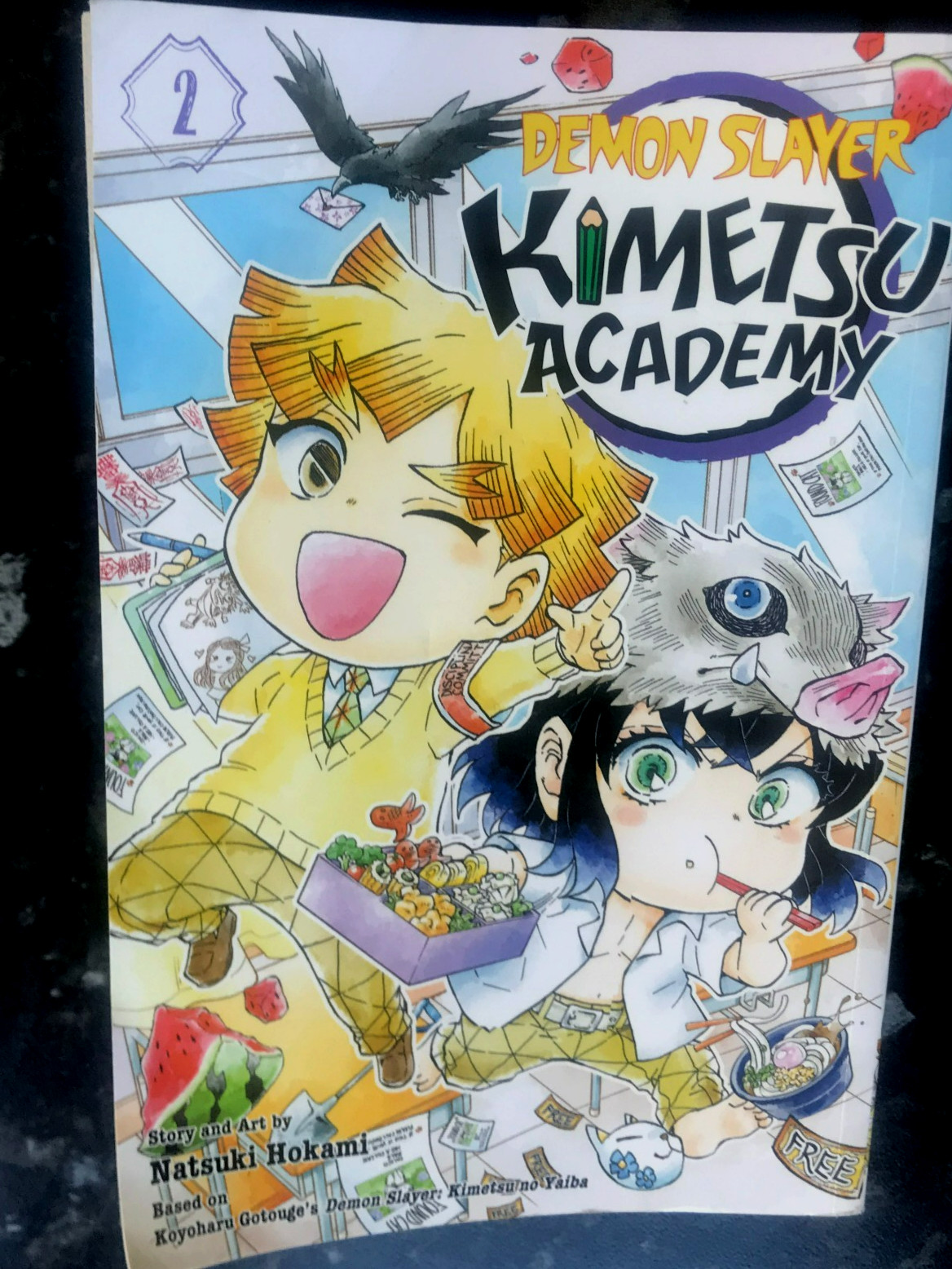Demon Slayer: Kimetsu Academy Vol. 2 English Softcover by Natsuki Hokami 2023