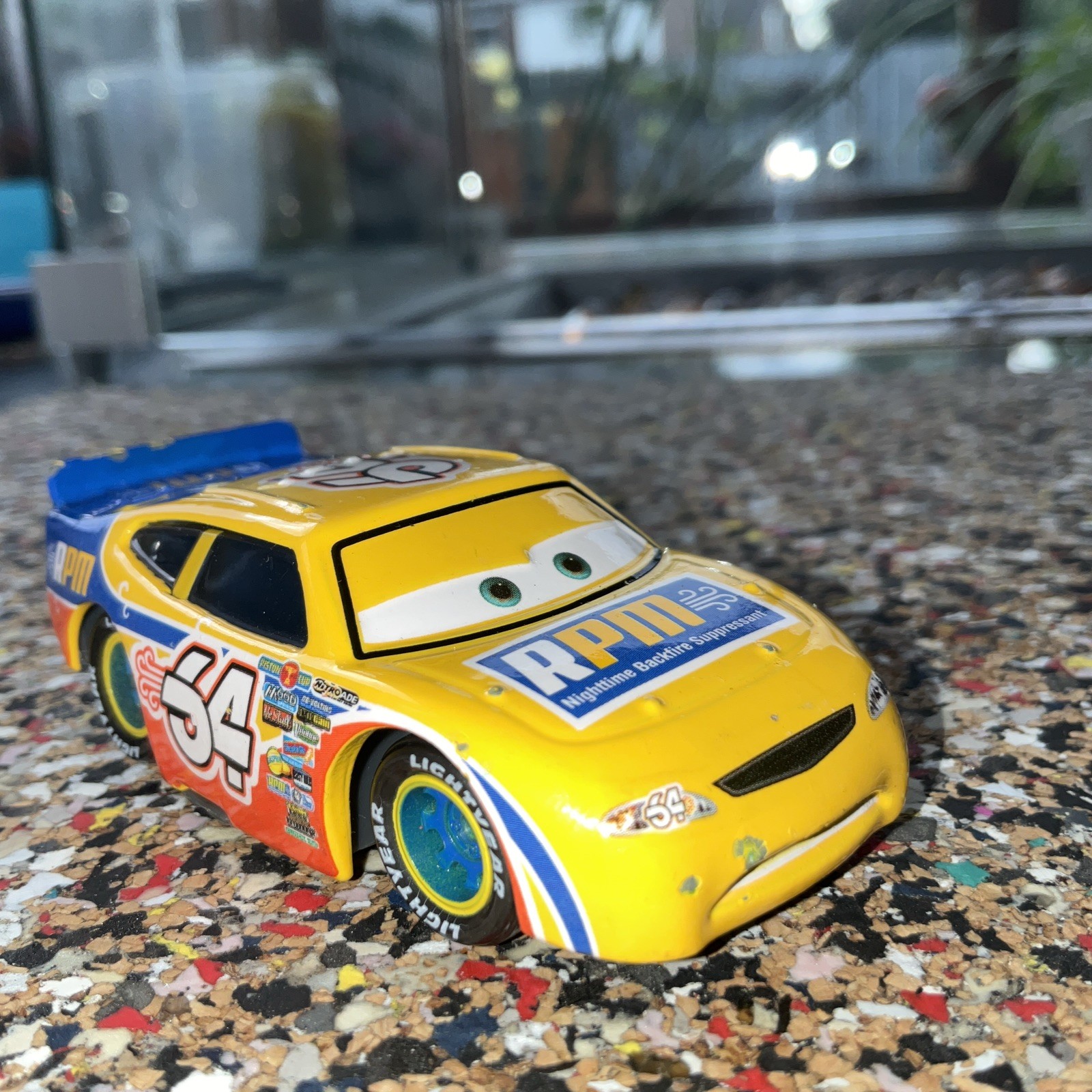 Disney Pixar Cars RPM #64 RACER pressofuso 1:55 Mattel_K159