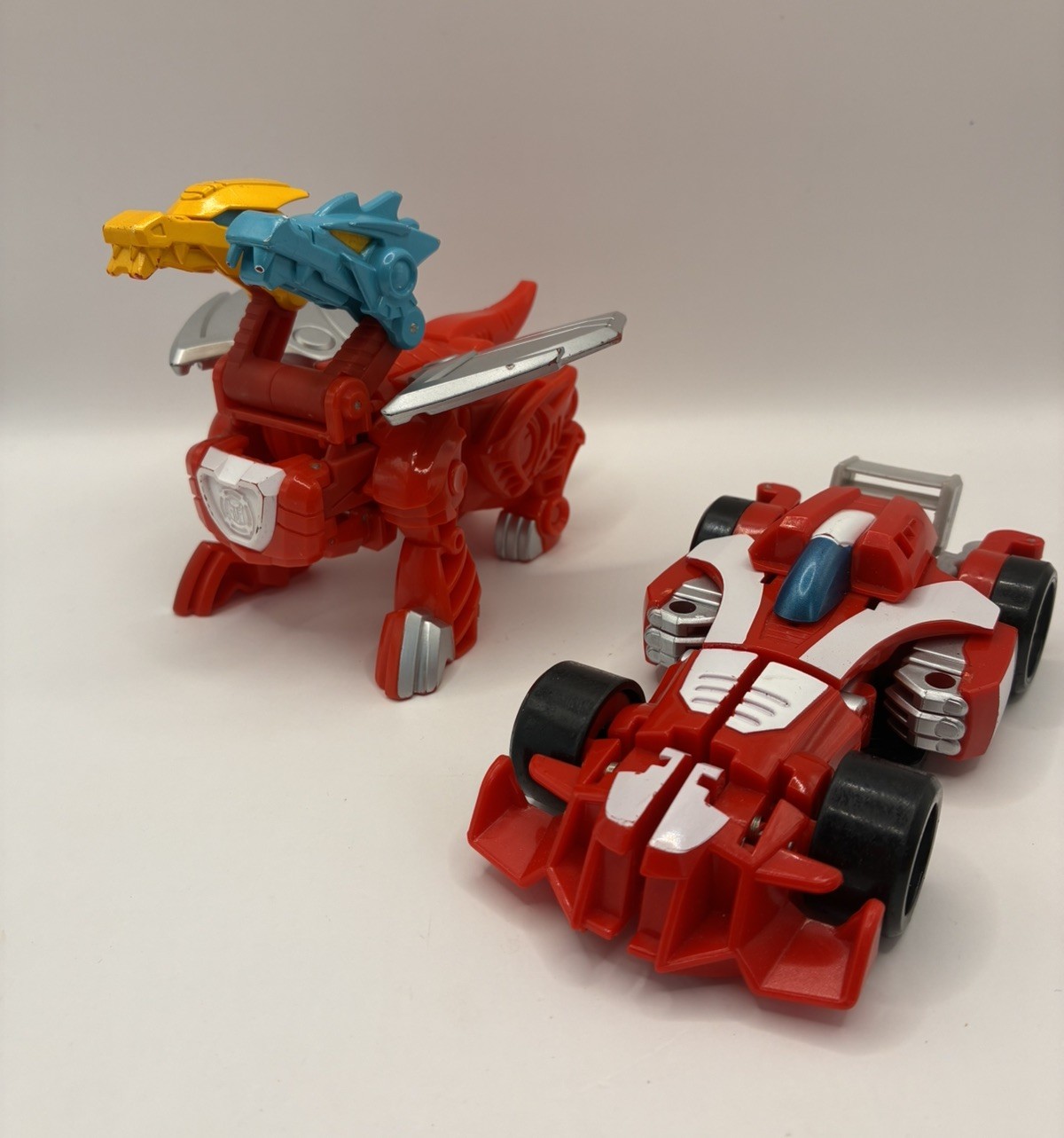 Transformers Rescue Bots Heatwave the Fire-Bot Bundle 2 Drago con Testa e Auto da Corsa