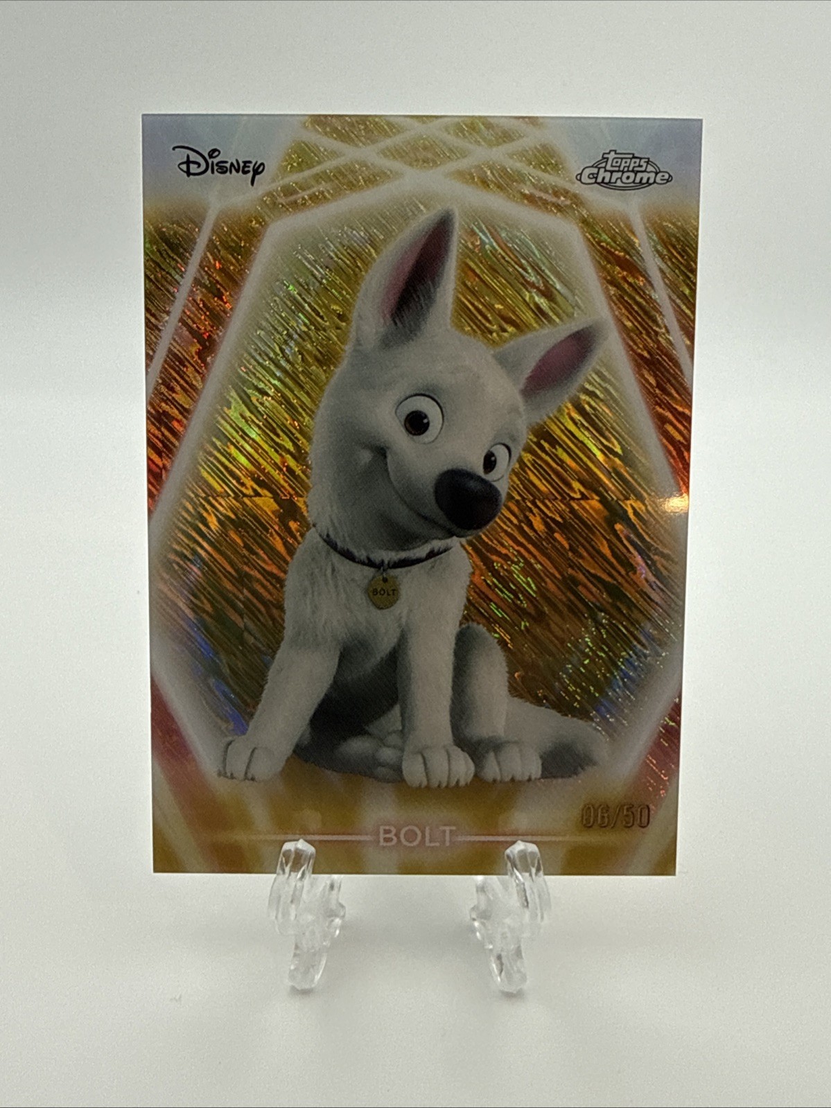 2026 Topps Neon Disney BOLT #CNE-128 Neon Incisione Oro 6/50