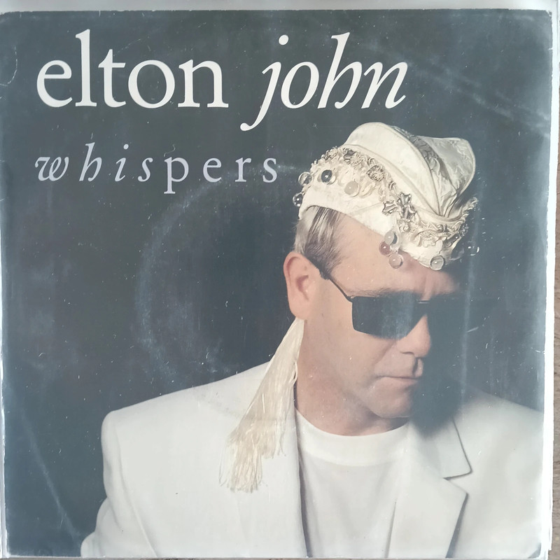 Elton John Whispers