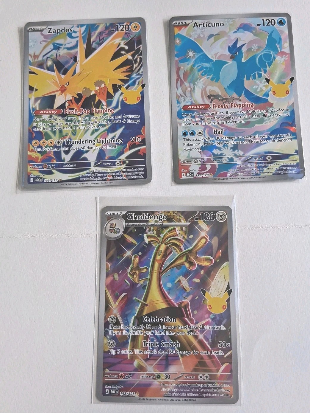 Lot Of 2  30th Celebrations Zapdos 133/128 And Articuno 142/128 IR’s Pokemon TCG
