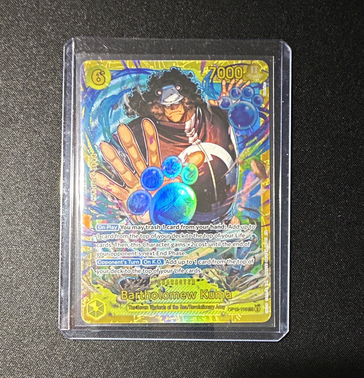 One Piece OP12-119 Bartolomeo Kuma personaggio segreto raro foil EN 7000 costo 6