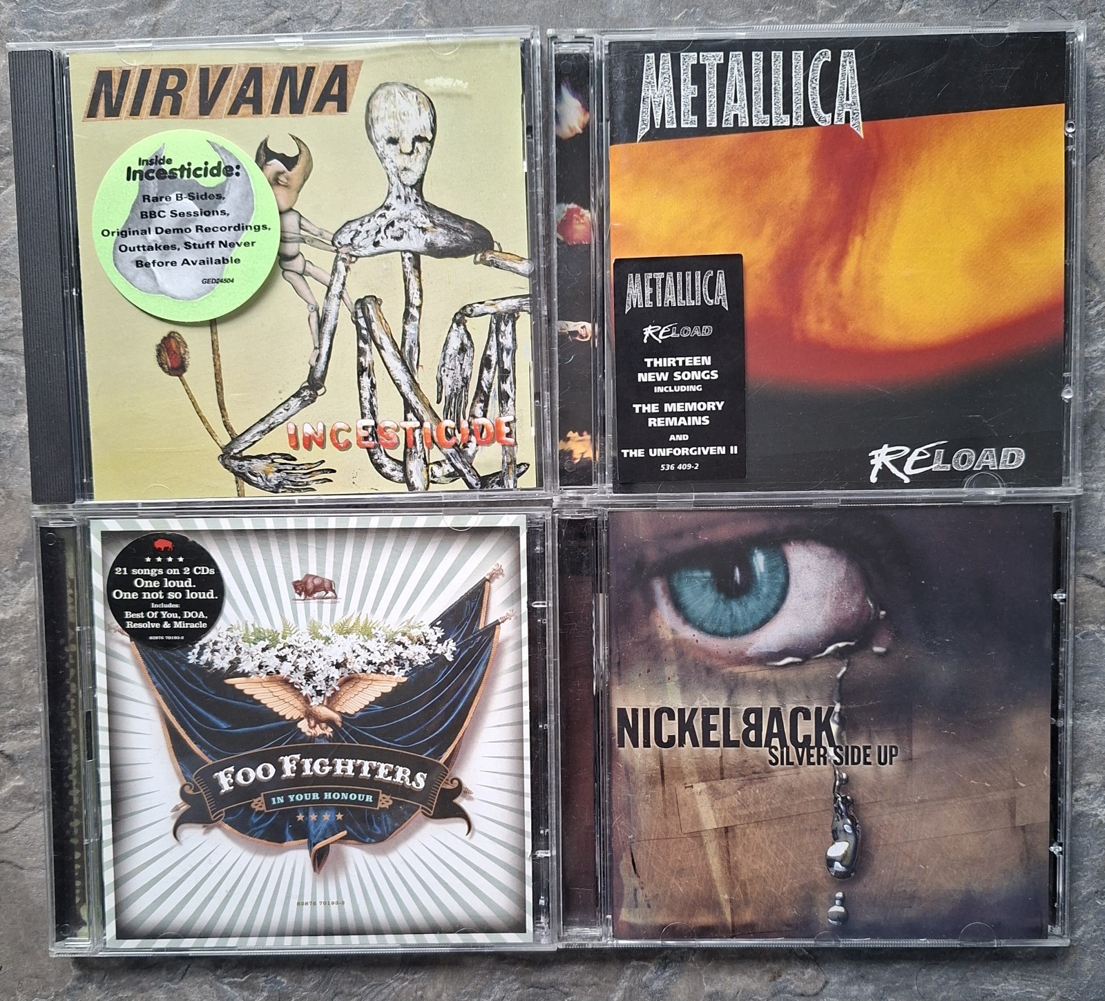 4x Rock CD Bundle - Metalica, Foo Fighters, Nirvana, Nickelback
