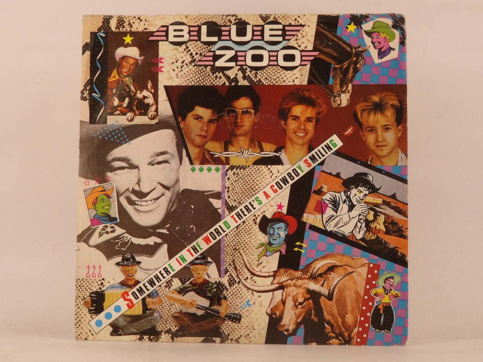 BLUE ZOO SOMEWHERE IN THE WORLD THERE'S A COWBOY SMILING (97) 2 Track 7" Single 