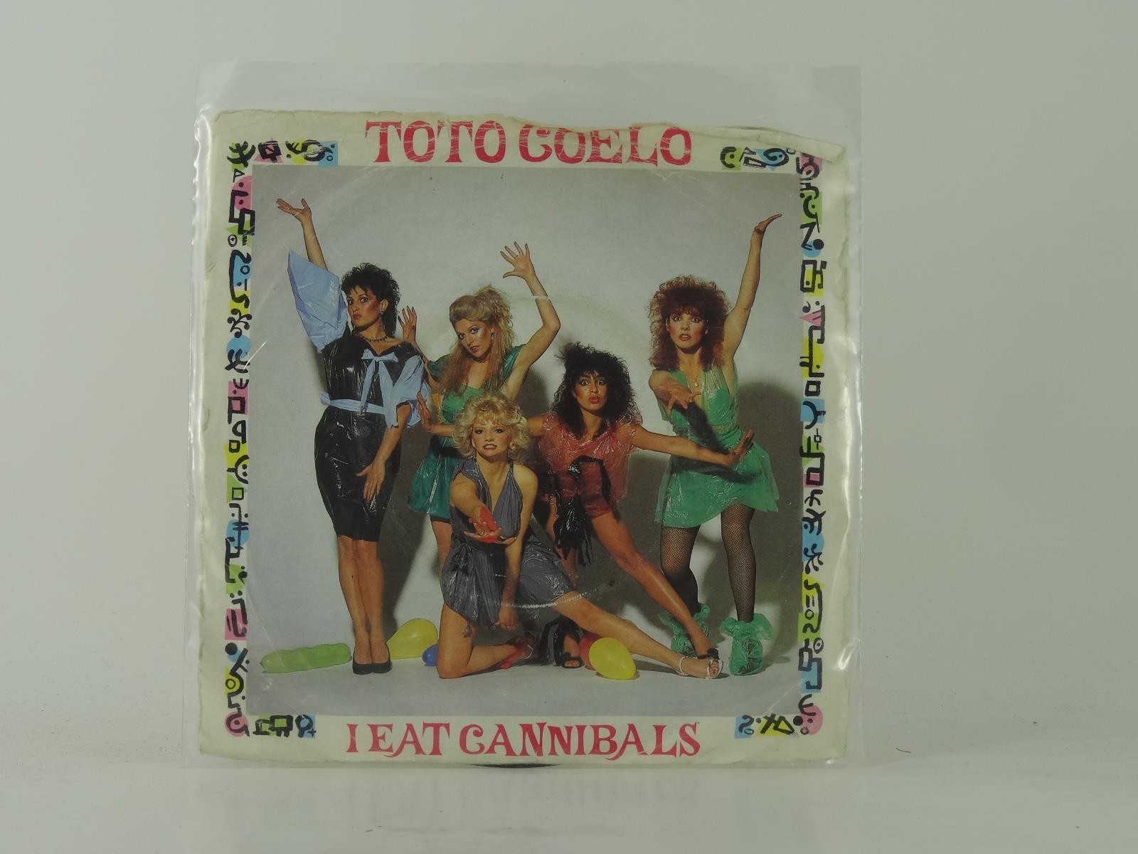 TOTO COELO I EAT CANNIBALS (10) 2 Track 7" Single including Picture Sleeve RADIA