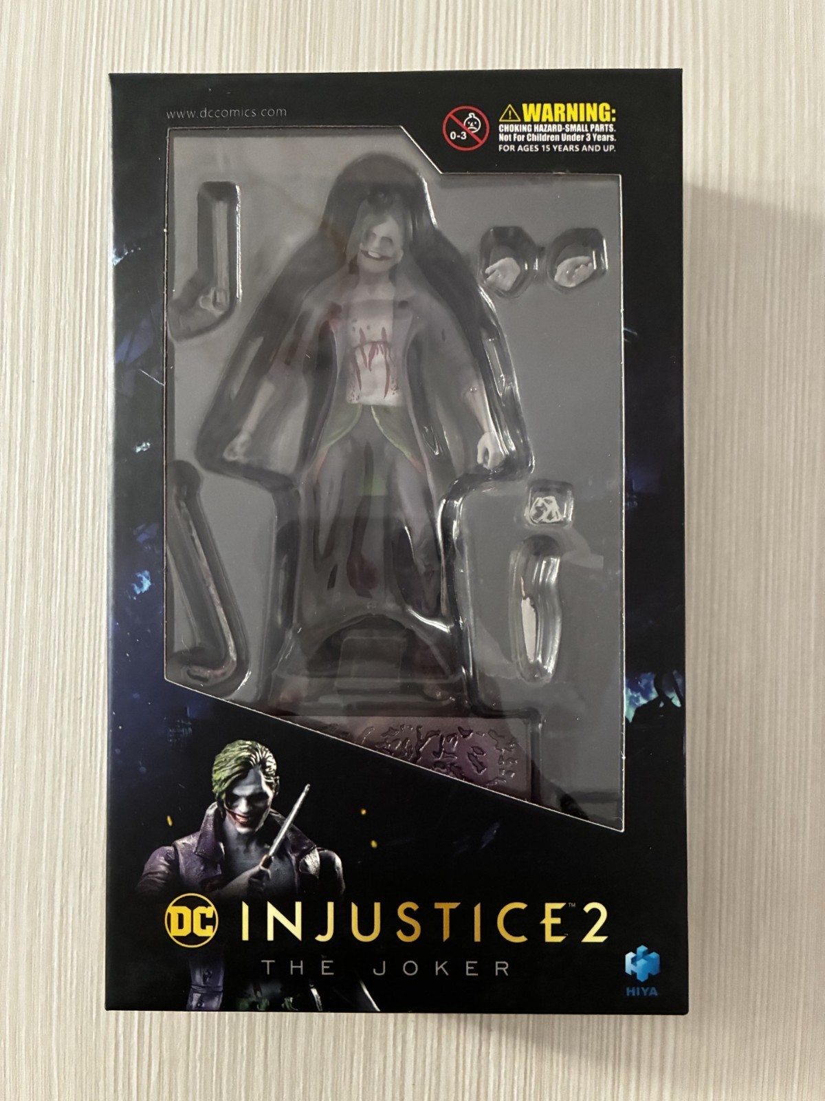 Hiya DC Comics Injustice 2 The Joker accessori action figure in scatola