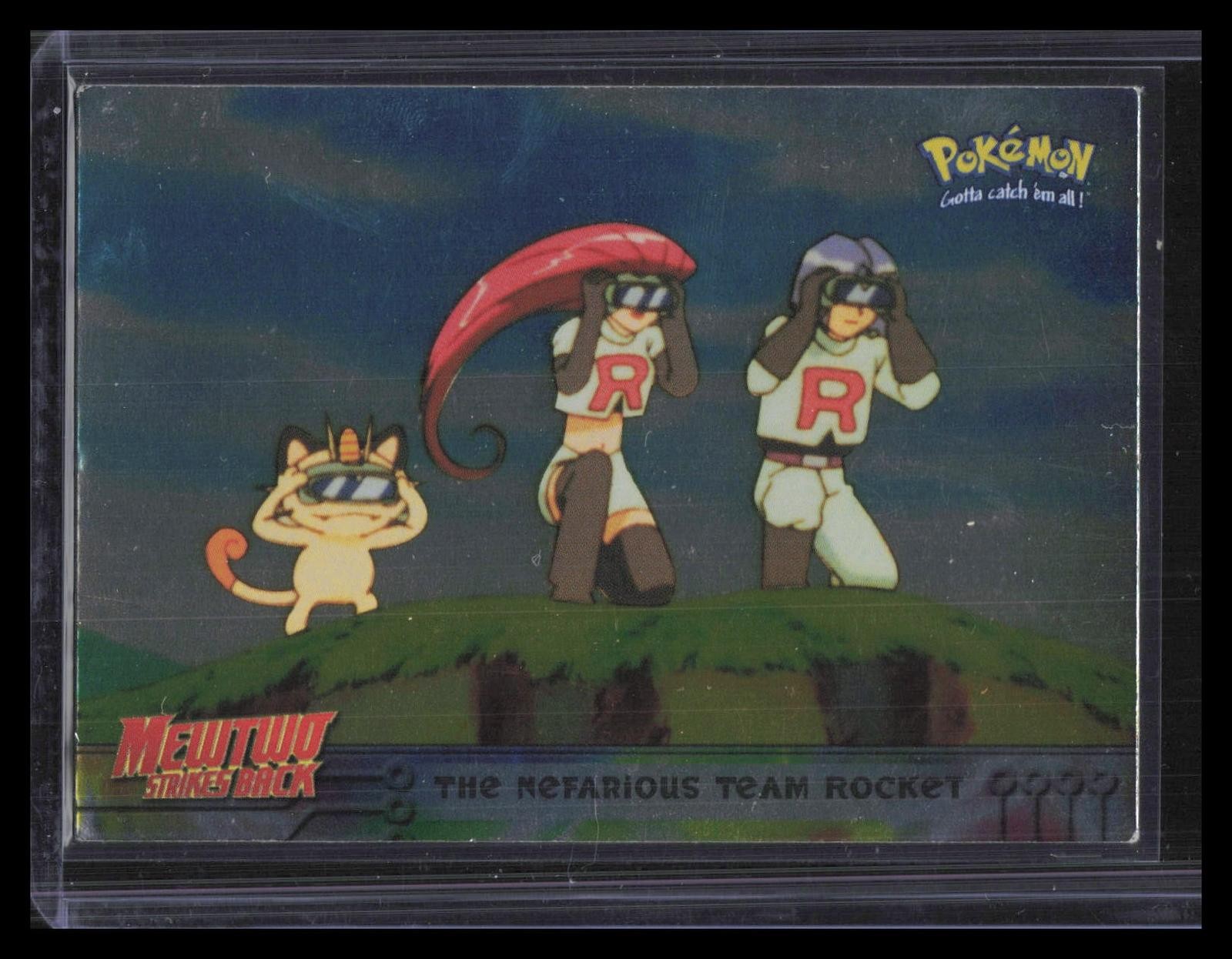 The Nefarious Team Rocket 1999 Topps Pokemon the First Movie #12 Foil