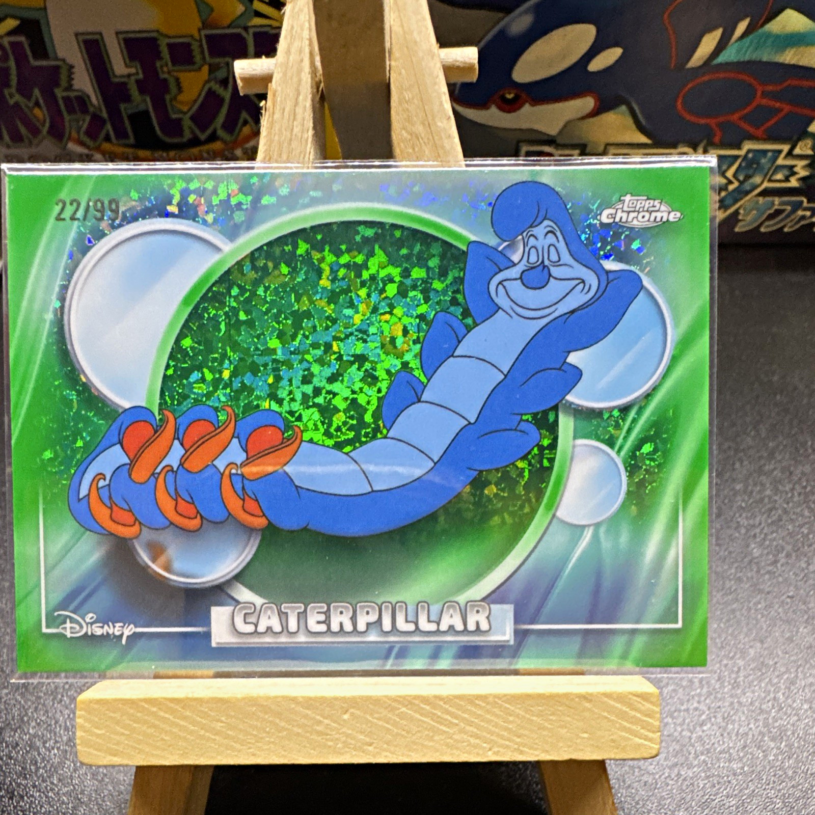 2026 Topps Chrome Disney  Caterpillar #78 22/99 green mini diamond