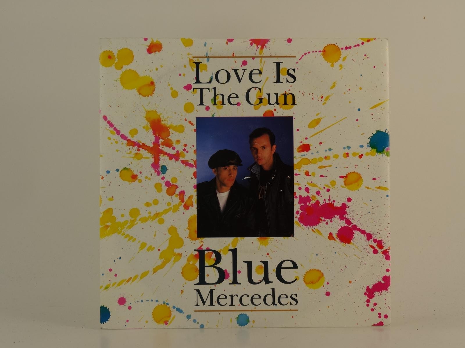 BLUE MERCEDES LOVE IS THE GUN (89) 2 Track 7" Single including Picture Sleeve MC