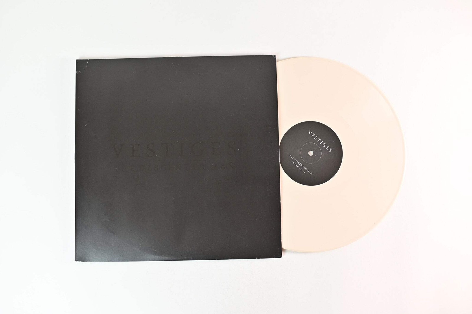 Vestiges - The Descent Of Man on Replenish  Bone Vinyl Screenprint DSide Reissue