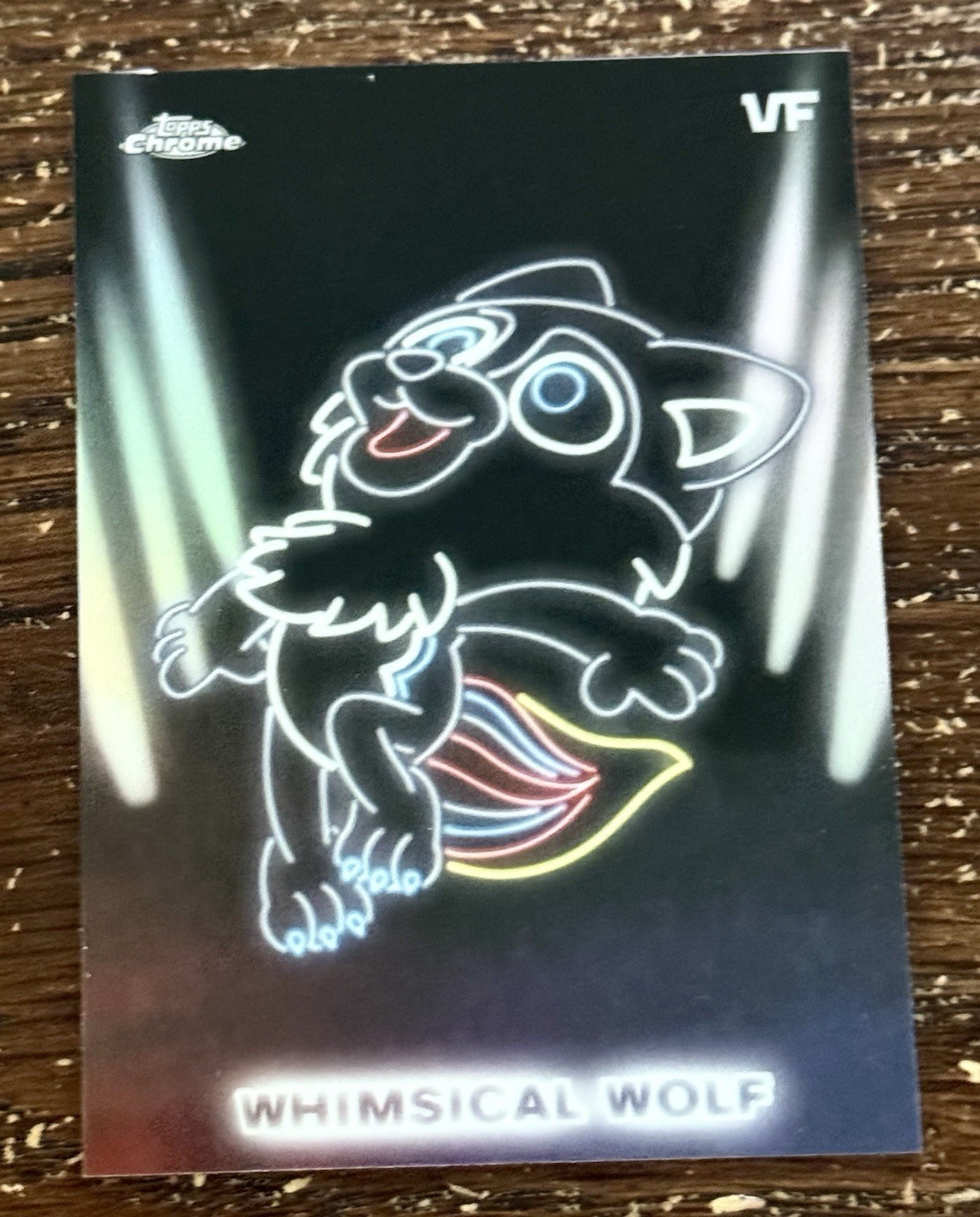 Inserto luci al neon lupo stravagante 2026 Topps Chrome VeeFriends #NE-3