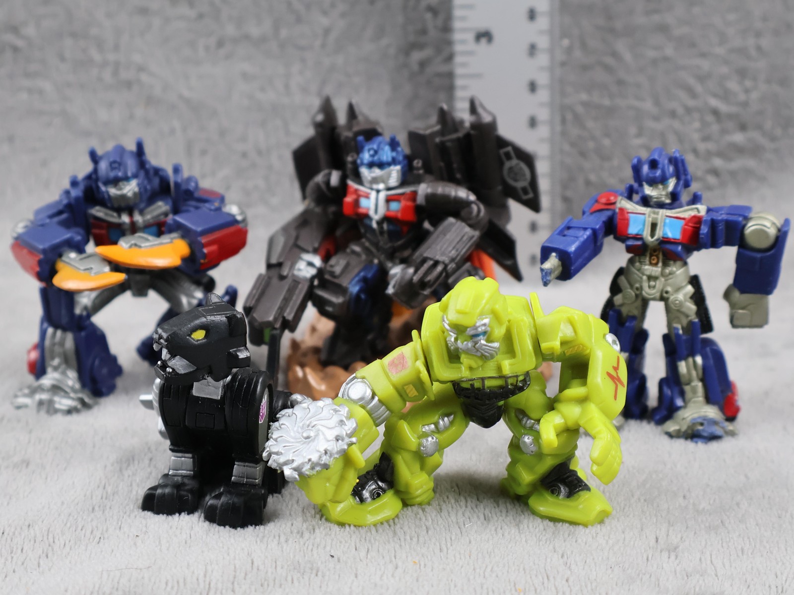 Lotto 5 action figure Transformers robot in plastica multicolore giocattoli sfusi