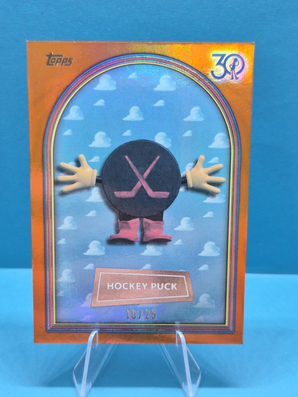 Hockey Puck - 2025 Topps 30 Years of Toy Story #11 Orange Refractor /25