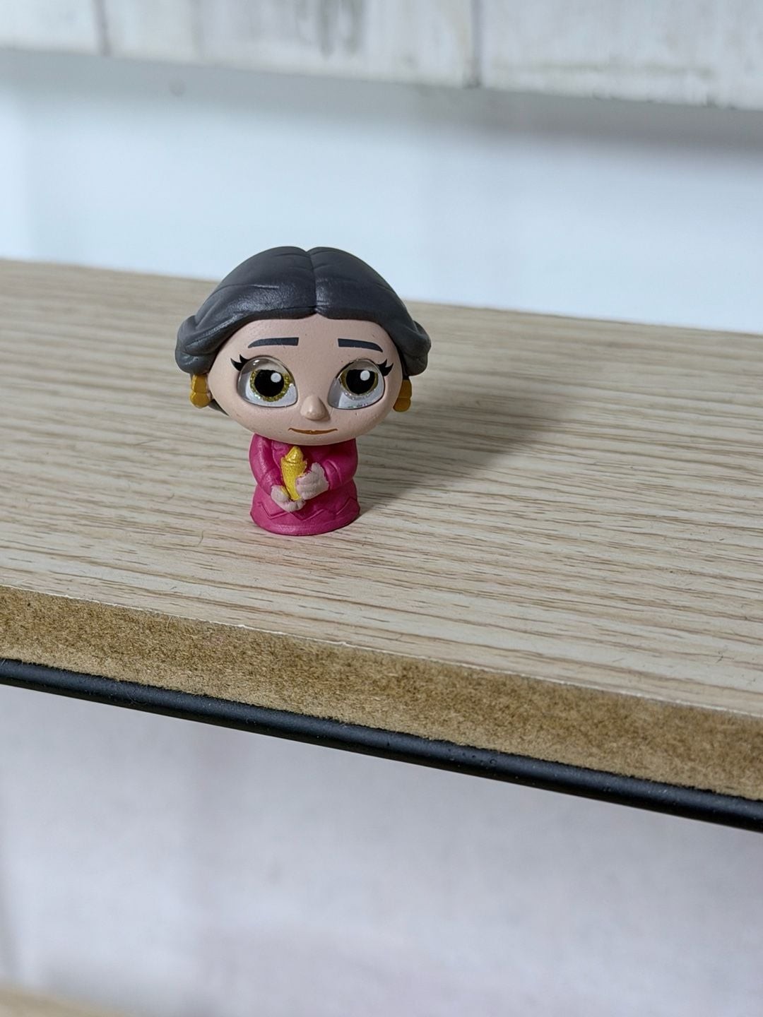 Disney Doorables Series 12 Pixel Perfect Alma Madrigal Figure from Encanto