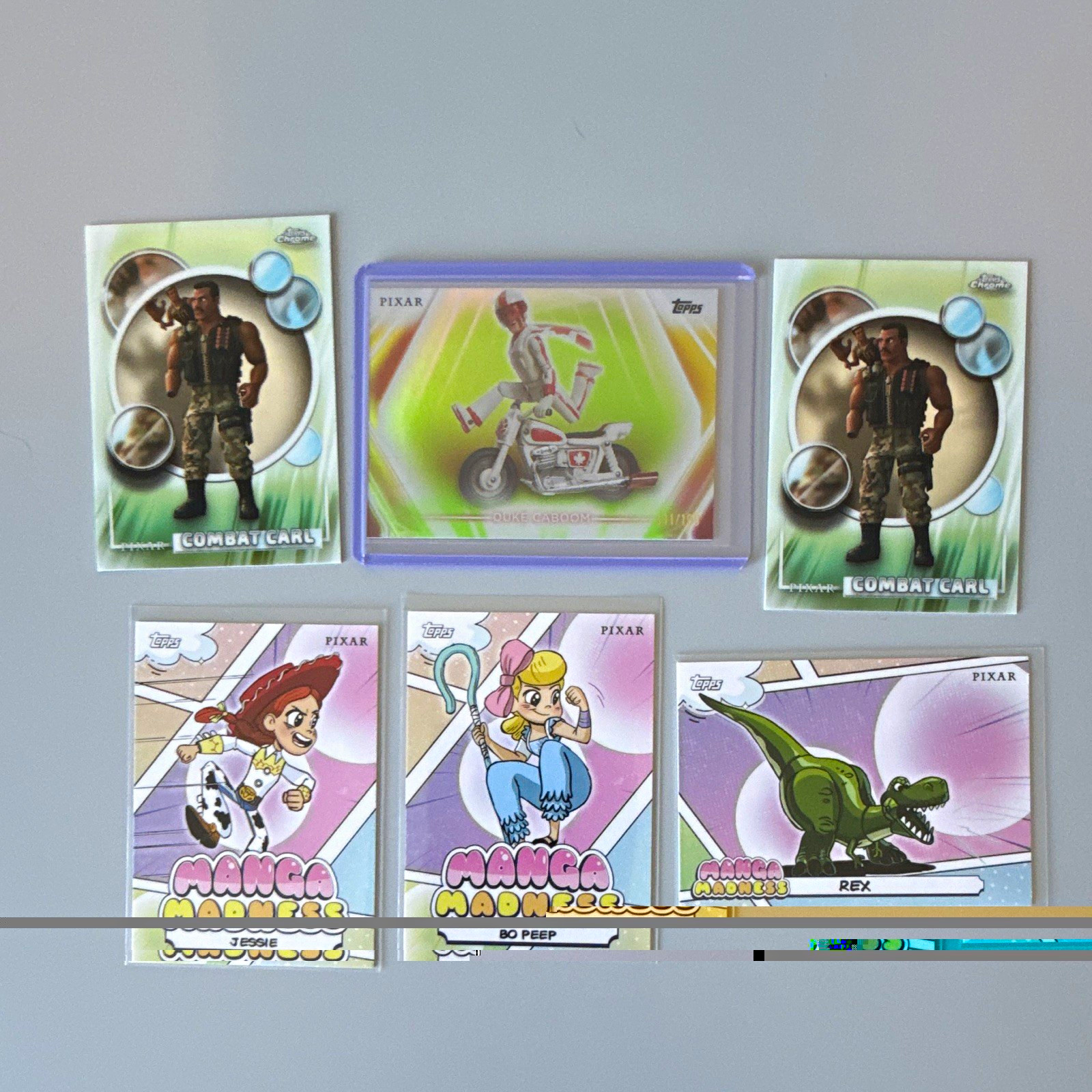 Lotto 5 carte Topps Disney Pixar Toy Story 4 Manga Madness Duke Caboom /199