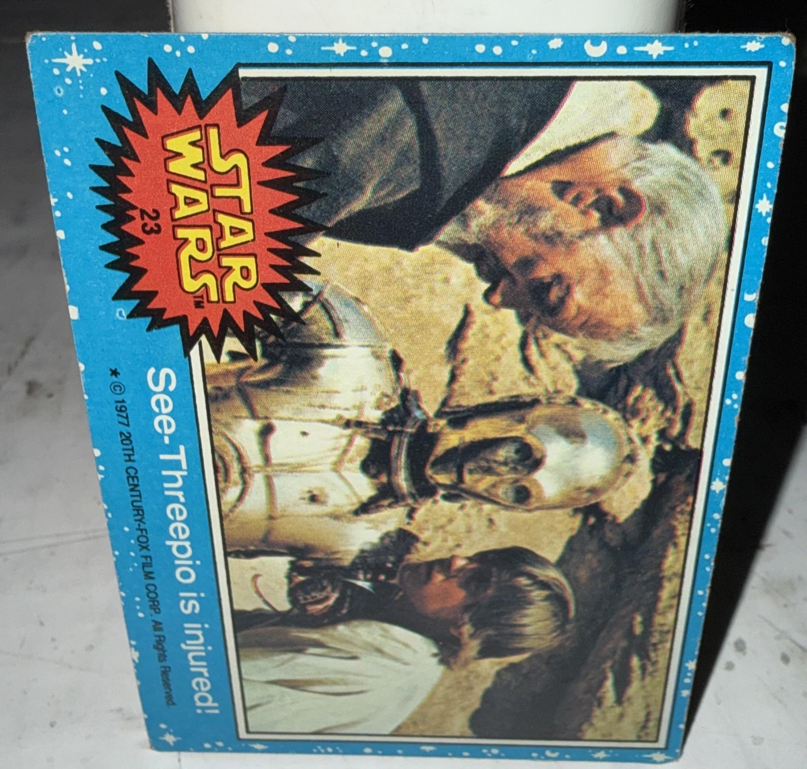 Carta Vintage 1977 Topps Star Wars 23 See-Threepio è ferito fatti film blu