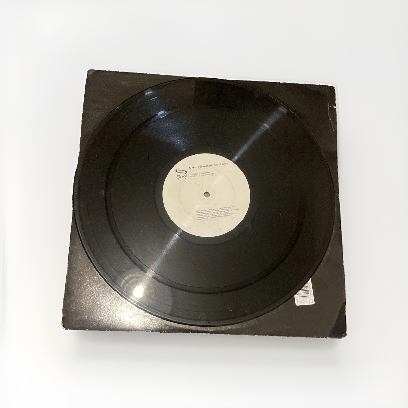 A Man Possessed – Black & White – Slinky Music – SLINKY 016 – 12” Vinyl – 2001
