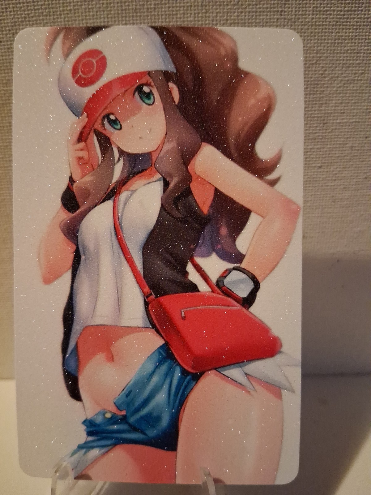 Carta collezionabile Hilda Pokémon Glitter Anime 
