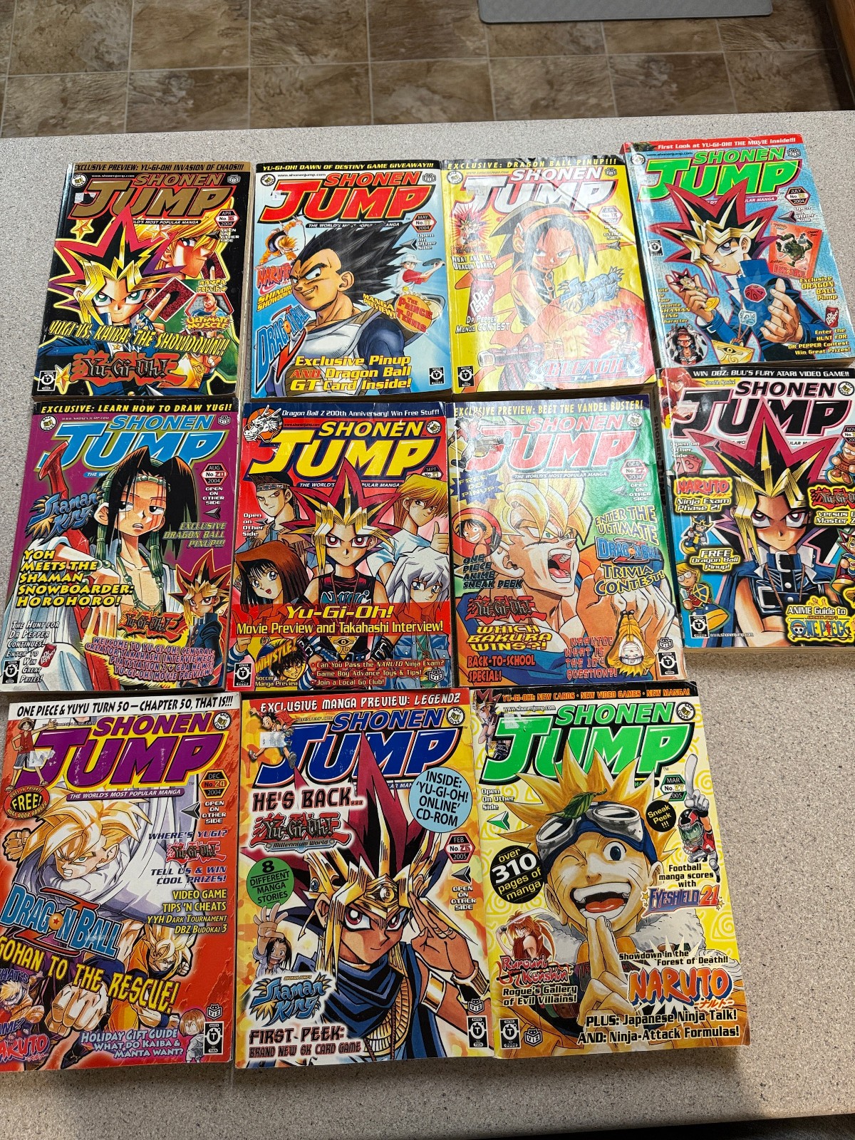 LOTTO 11 riviste shonen jump lotto inglese. PIÙ COMPLETO. 3 POSTER MANCANTI.