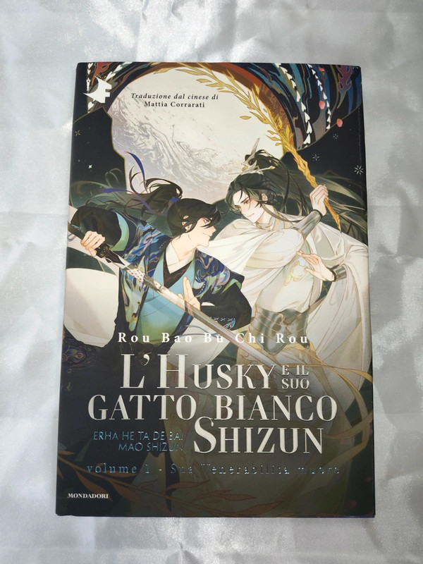 L'Husky e il suo gatto bianco Shizun