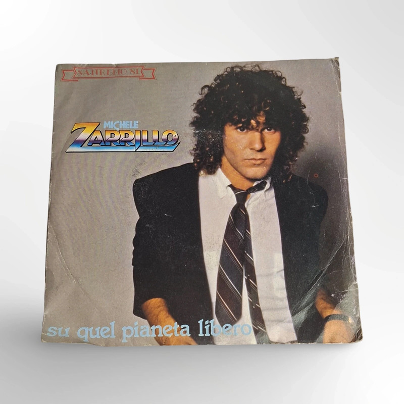 Michele Zarrillo Su quel pianeta libero / Strano 7" 45 giri singolo Cbs 6932